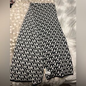Reversible black and white MK scarf